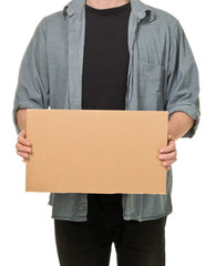 Man holding empty cardboard sign