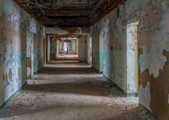 Fototapeta na wymiar Long corridor inside Trans-Allegheny Lunatic Asylum
