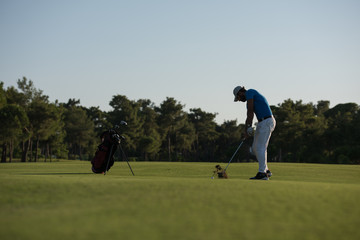 golfer hitting long shot