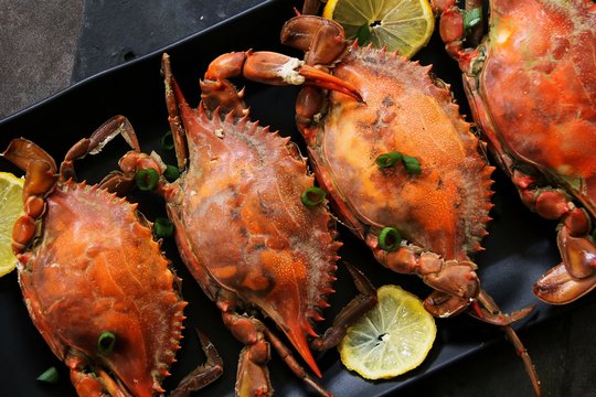 Steamed Blue Crabs With Lemon Garnish