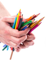 Naklejka premium Bunch of color pencils in hands