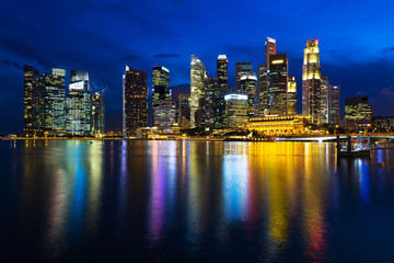 Fototapeta na wymiar Landscape of the Singapore financial district and business buildings in lights at night outdoors