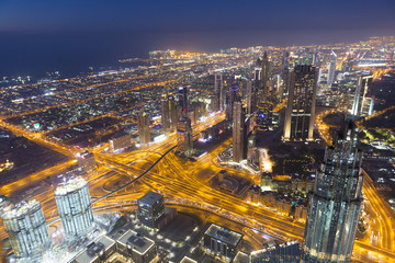 Dubai night city skyline with modern skycrapers, UAE