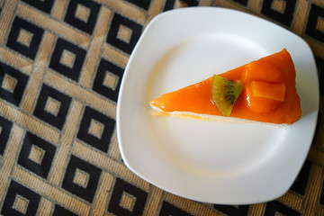 orange crape cake on table, Selective Focus