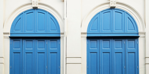 Blue door with wall