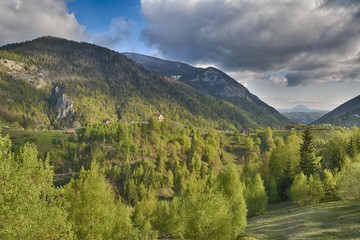Obraz premium Carpathian Mountains, Romania. Rural landscape with Magura village in Piatra Craiului National Park
