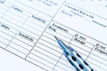 Medical record form with pen