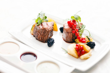 steak with fresh berries