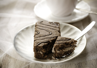 Cup on the table and cake