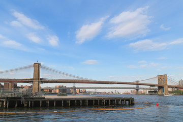 Fototapeta na wymiar Brooklyn bridge with blue sky