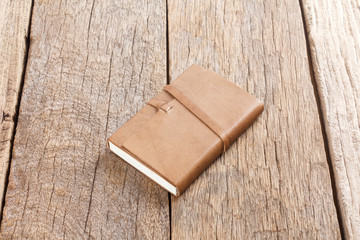 Brown Leather notebooks on wooden table