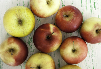 apples on wooden background