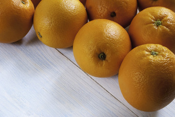 oranges on weathered wooden table