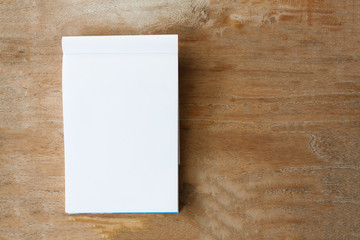 Blank paper on wood table