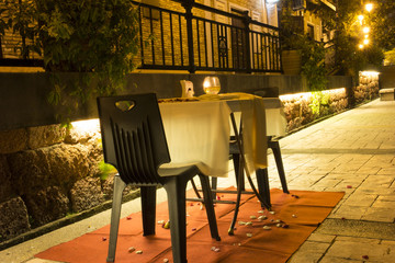 Table and seats in romantic atmosphere