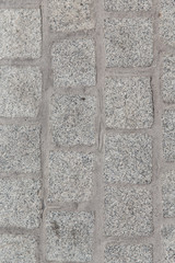 close up of paving stone or facade tile texture