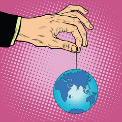 Planet earth in hand on the rope