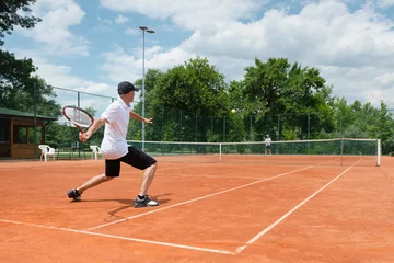 Foto op Canvas Friends playing tennis on clay court © Microgen