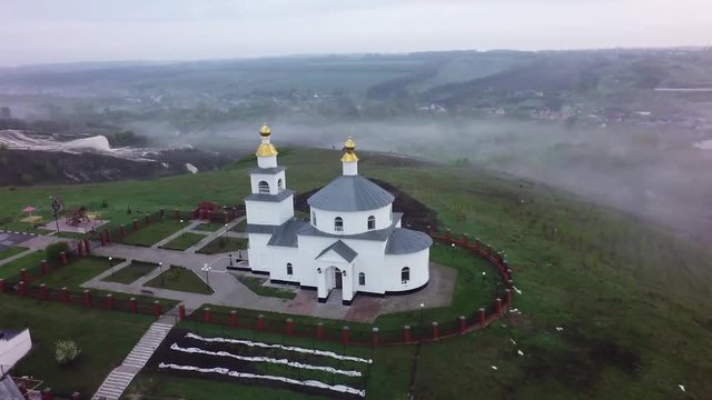 AERIAL:flying over church (video filmed with quadcopter drone)