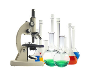 Laboratory metal microscope and test tubes with liquid isolated