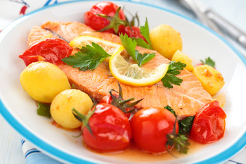 Fried salmon  with vegetables.