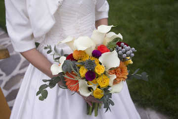 Wedding bouquet in a brides hands