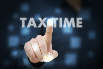Businessman touching Tax Time