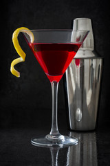 Cosmopolitan cocktail on black background
