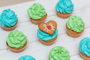 Cupcakes with green and blue cream