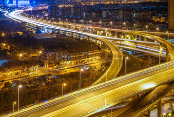 Fototapeta na wymiar aerial night view of shanghai illuminated overpass