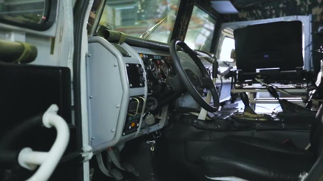 Cabin Military Car With a Control System and a Laptop Russia