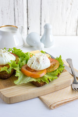 Sandwich with poached eggs