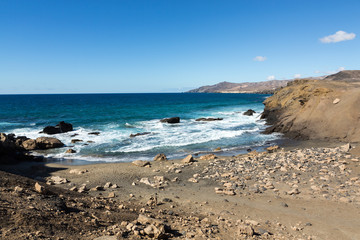Fototapeta na wymiar Rock coast near La Pared village on the south western part of Fuerteventura . Canary Islands, Spain