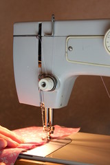 Electric sewing machine.