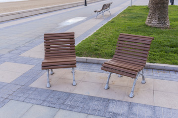 Wooden benches in Benicassim (Castellon, Spain).