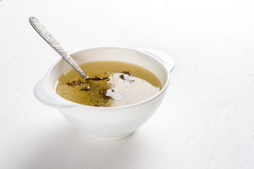 Chicken soup in plate