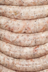 raw meat sausages, closeup view