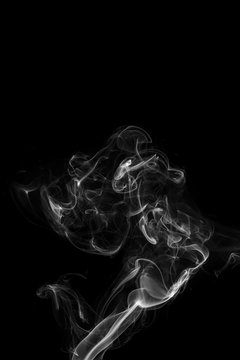 Abstract gray smoke from the incense sticks.