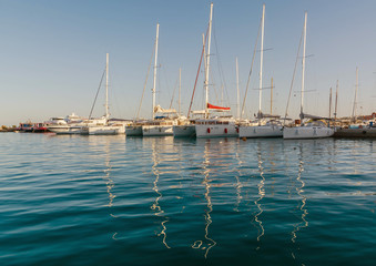 Fototapeta na wymiar Sea bay with yachts at sunset in Egypt