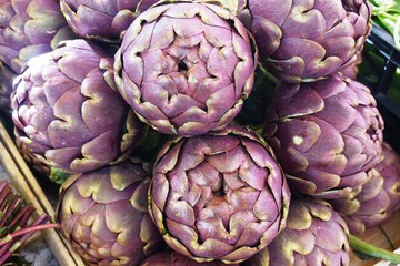 Purple artichokes (carciofi) at an Italian farmers market