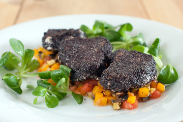 Pork Tenderloin in Poppy Seeds with olive salsa