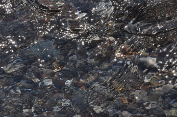 Colorful stones under sea water
