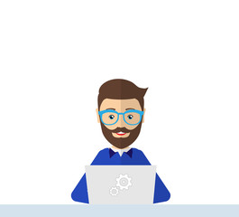 Workplace. Employee works at a laptop