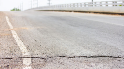 Asphalt bridge cracks.