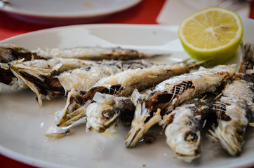 fried canarian mackerel served with lemon half on white dish
Tenerife, Canary Islands, Spain