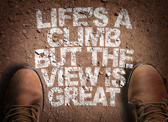 Top View of Boot on the trail with the text: Life's a Climb But The View is Great