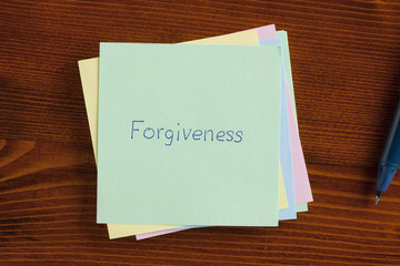 Forgiveness written on a note