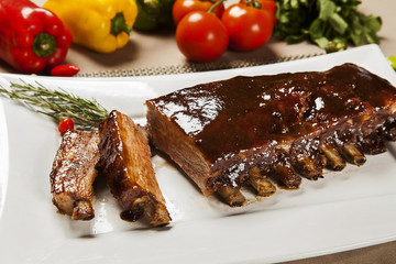 delicious roast pork rib won white dish