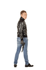 Naklejka premium young man in a black jacket looking at camera. Image on a white background.