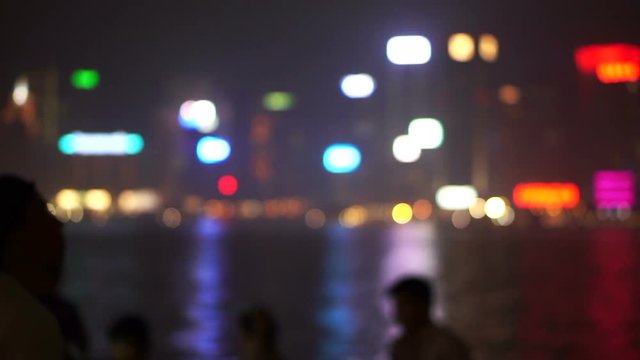 Blur background view of World famous skyline Hong Kong harbour at night. Tourist landmark popular view